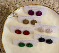 glittery pumpkin studs